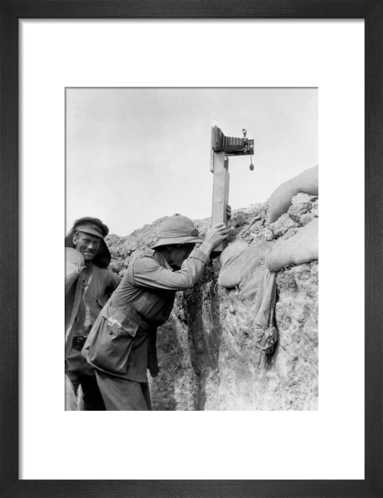 Soldier taking a photograph with a camera attached to a periscope, c 1915. - Image 8
