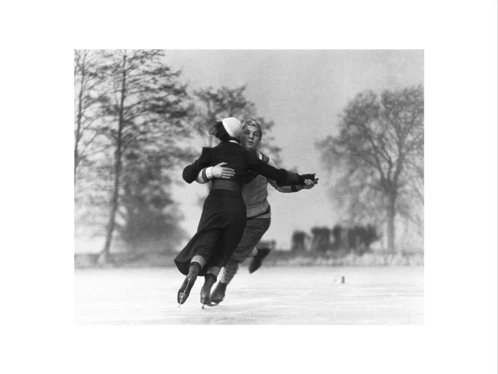 Couple skating on an ice rink, c 1930s. - Image 22
