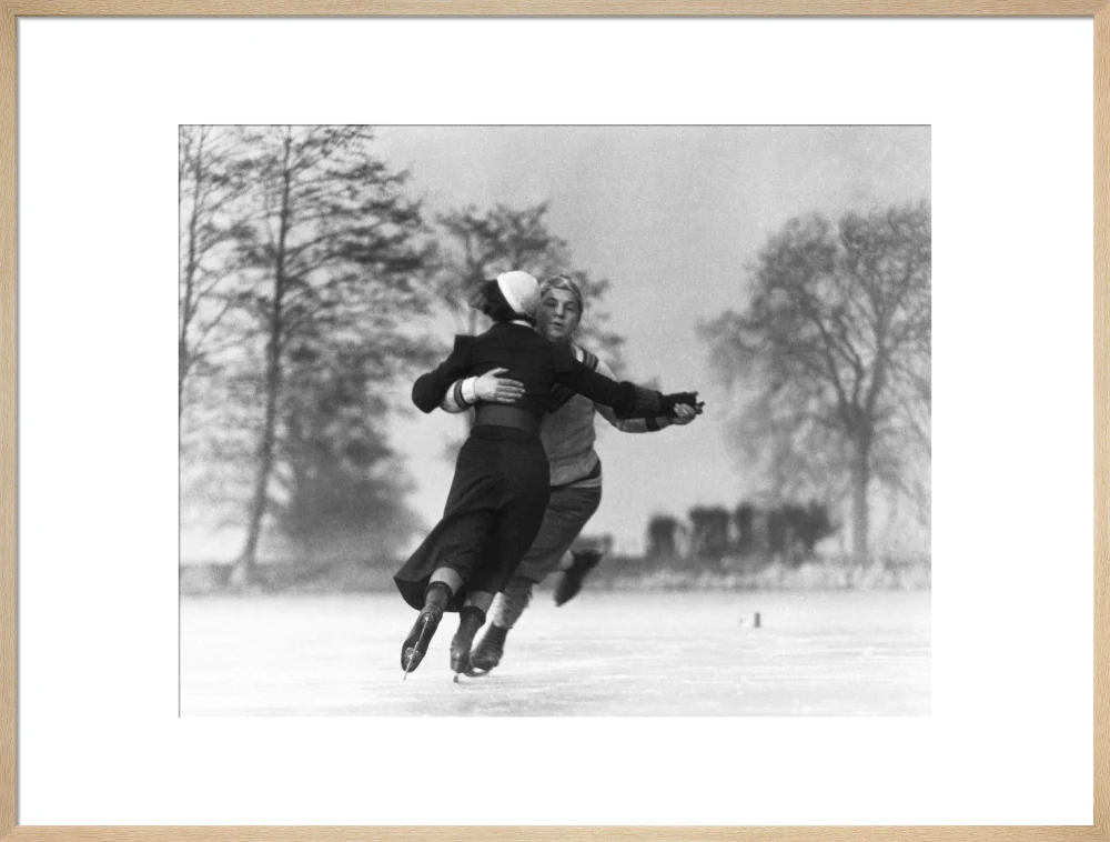 Couple skating on an ice rink, c 1930s. - Image 26