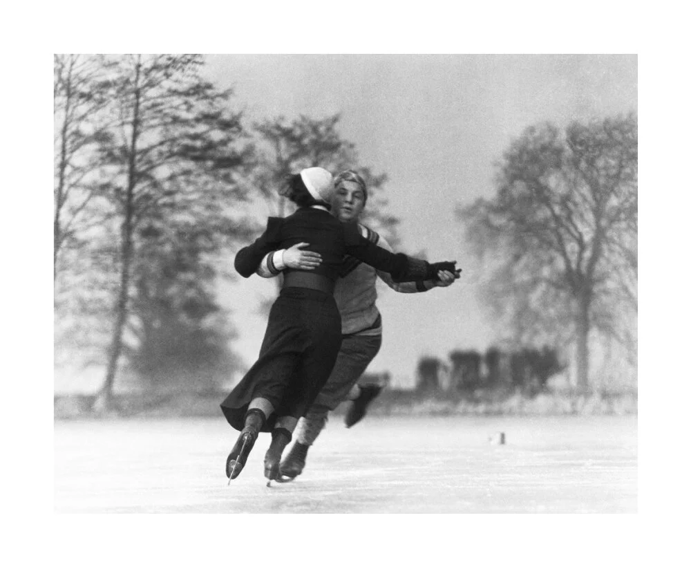 Couple skating on an ice rink, c 1930s. - Image 29