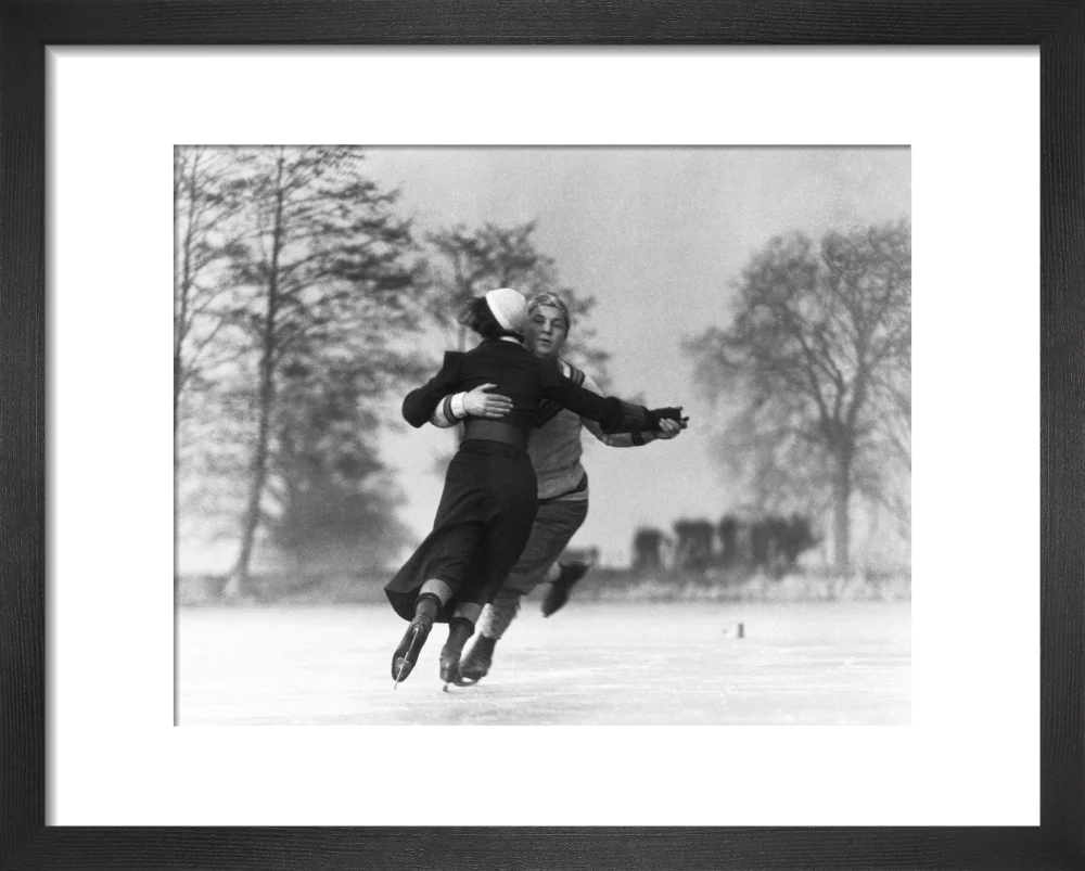 Couple skating on an ice rink, c 1930s. - Image 3