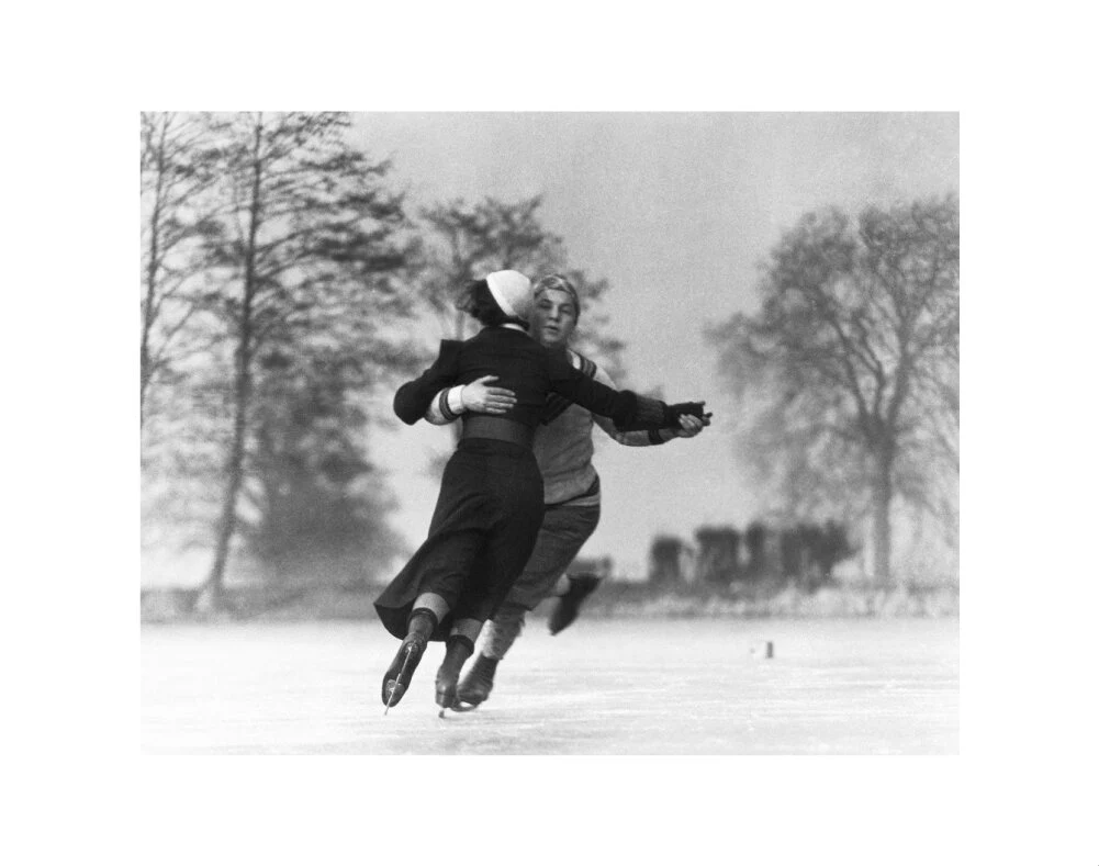 Couple skating on an ice rink, c 1930s. - Image 35