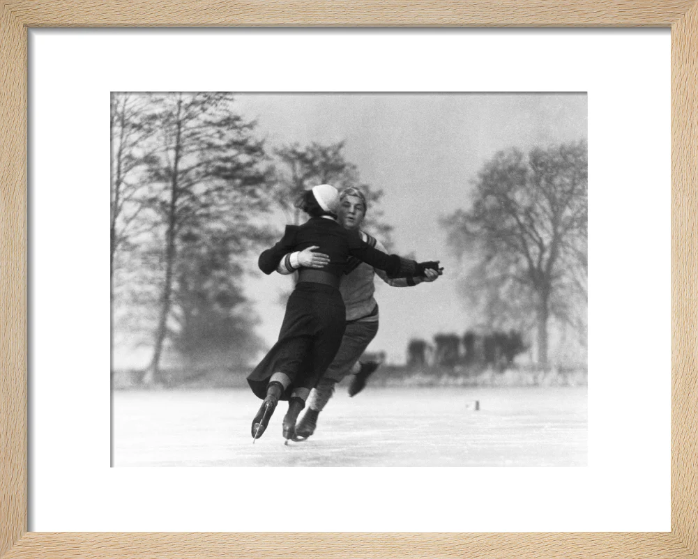 Couple skating on an ice rink, c 1930s. - Image 39
