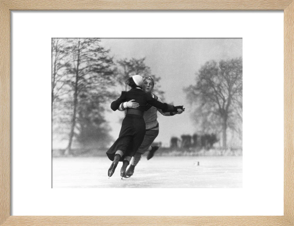 Couple skating on an ice rink, c 1930s. - Image 44