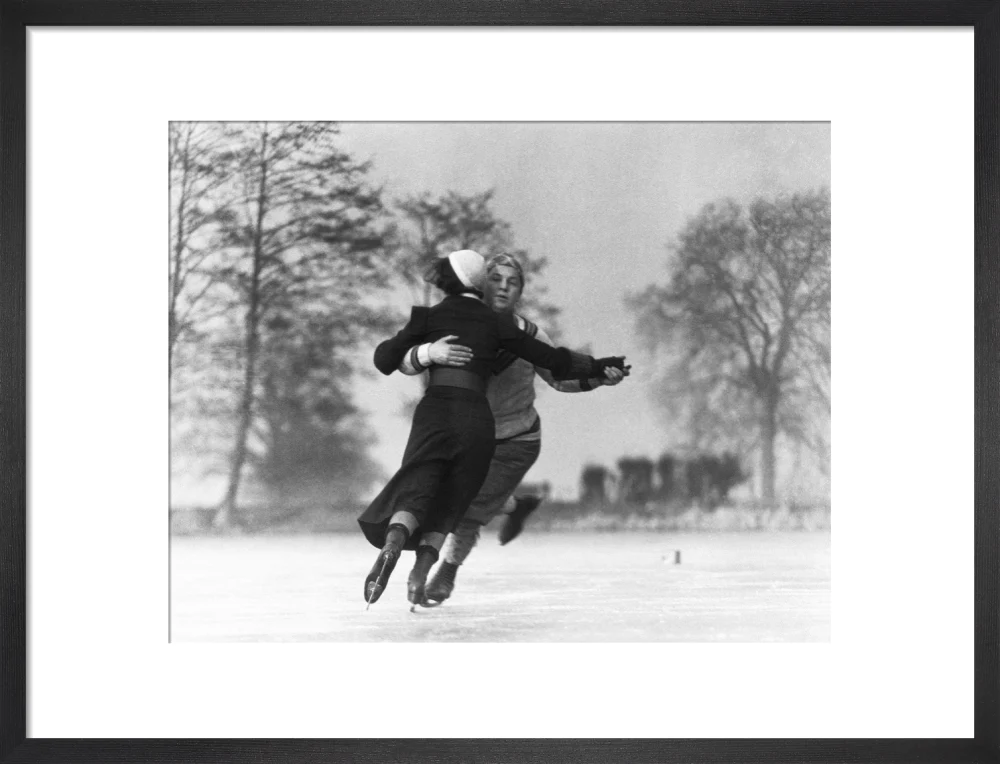 Couple skating on an ice rink, c 1930s. - Image 46