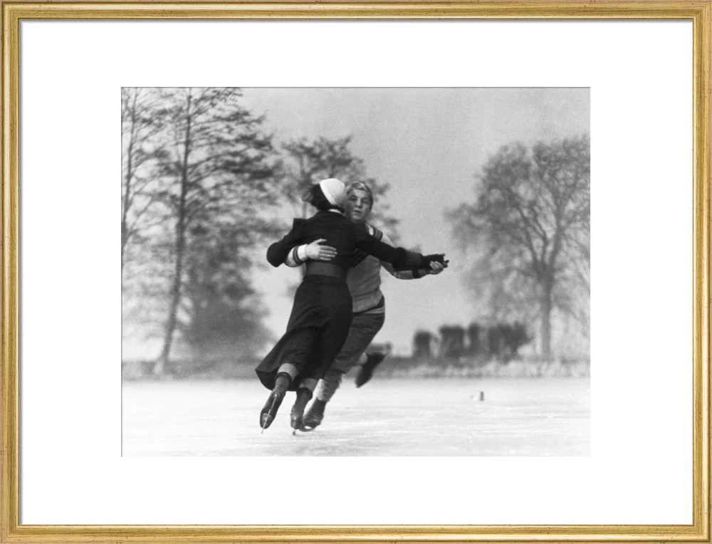 Couple skating on an ice rink, c 1930s. - Image 53