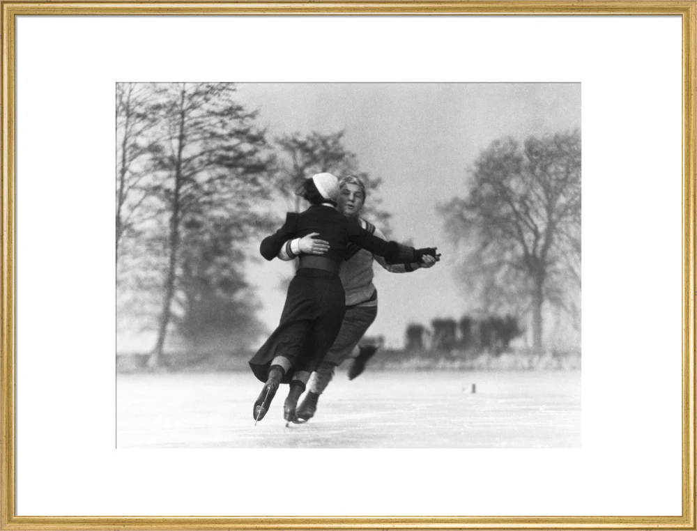 Couple skating on an ice rink, c 1930s. - Image 58