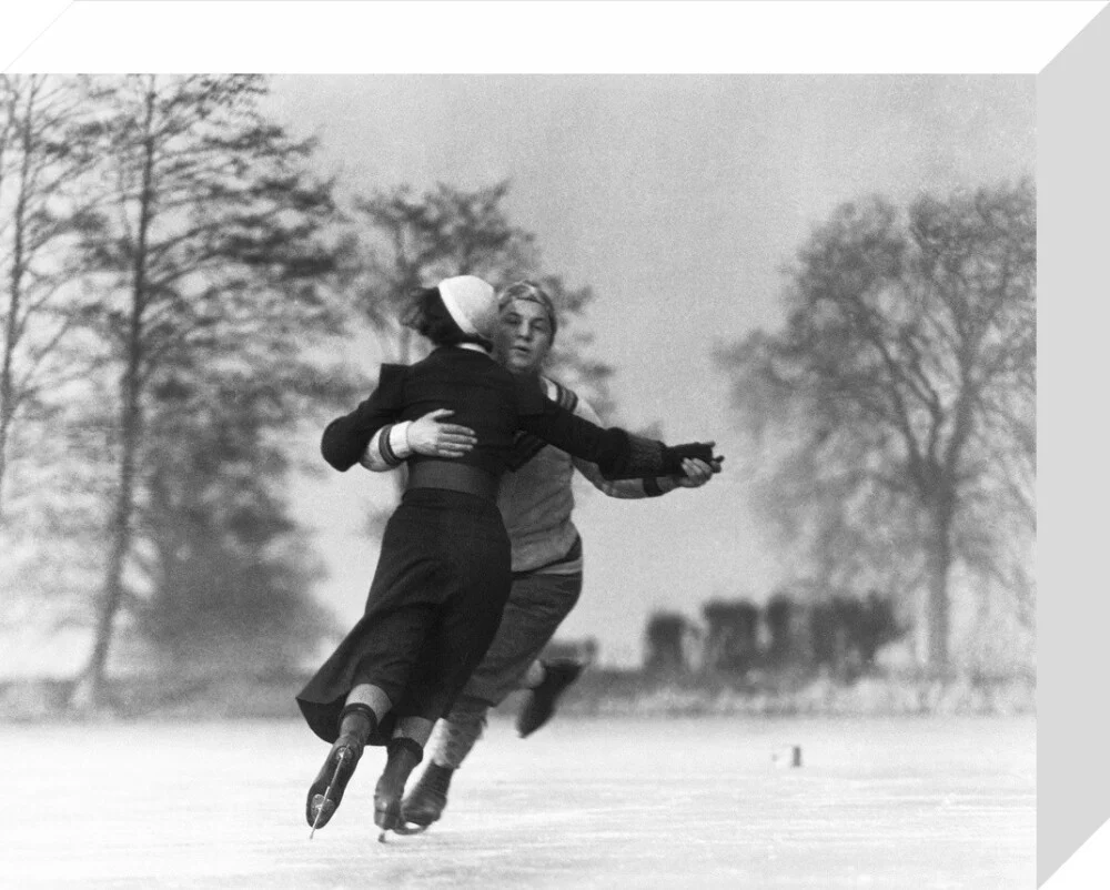 Couple skating on an ice rink, c 1930s. - Image 64