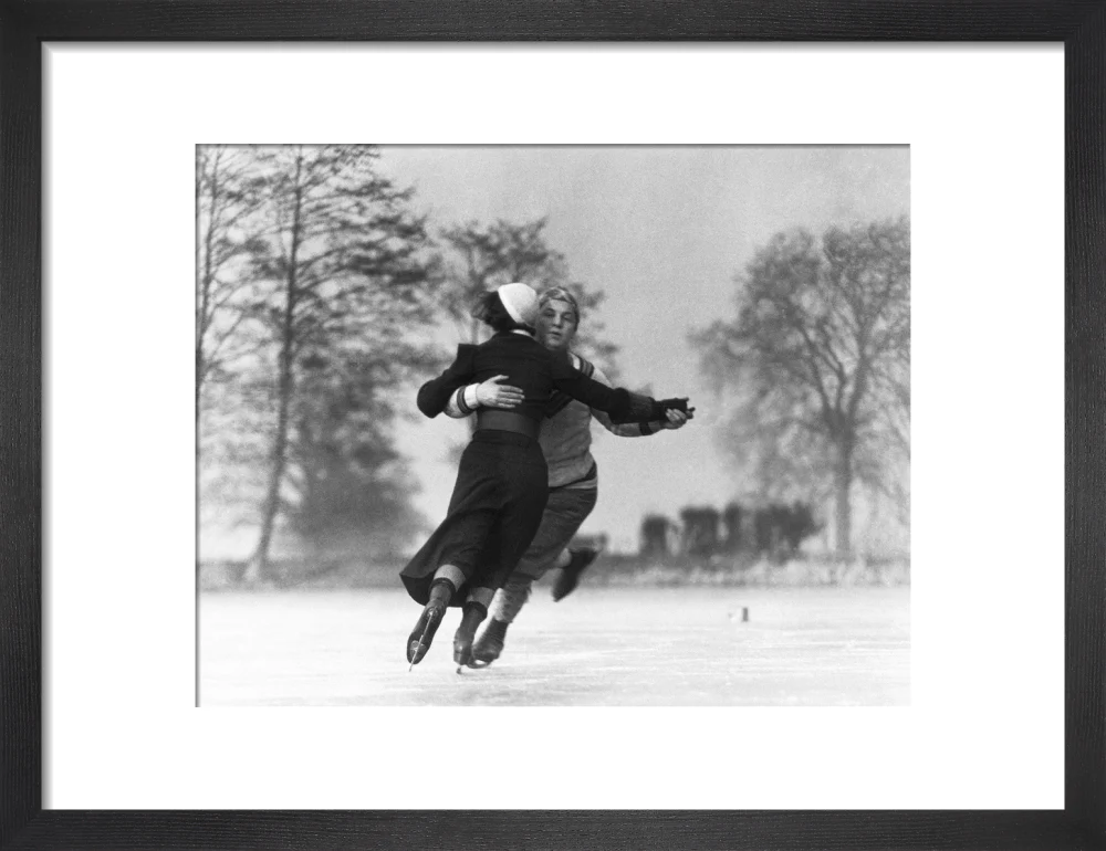 Couple skating on an ice rink, c 1930s. - Image 8