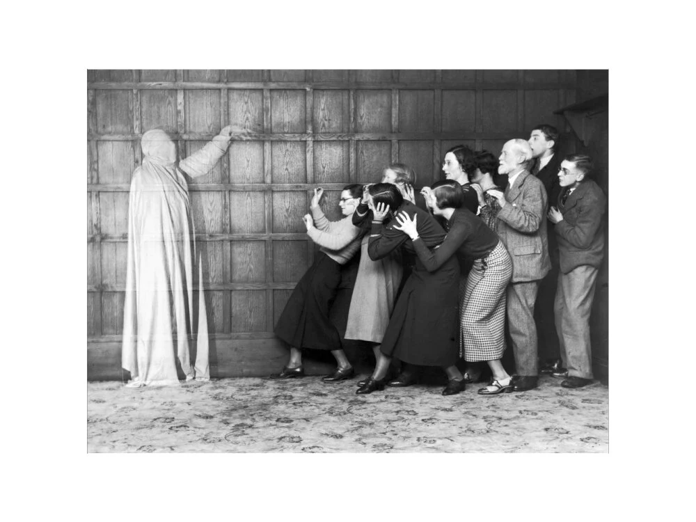 People 'cowering in fear' at the sight of a ghost, c 1920s. - Image 12