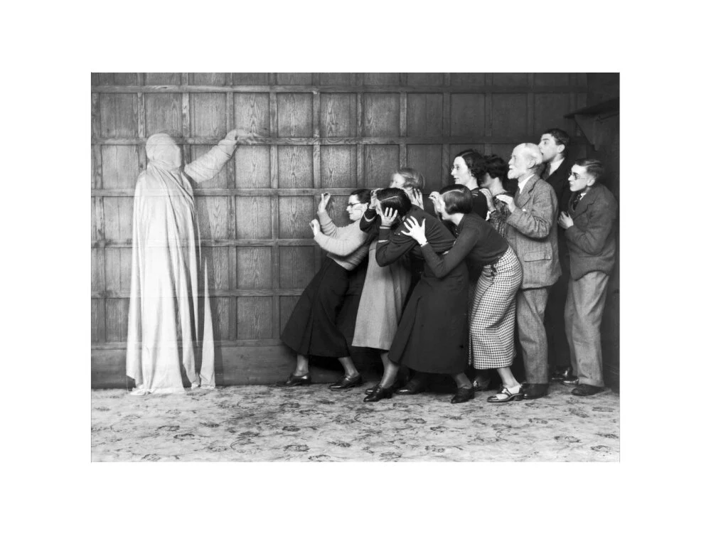 People 'cowering in fear' at the sight of a ghost, c 1920s. - Image 17