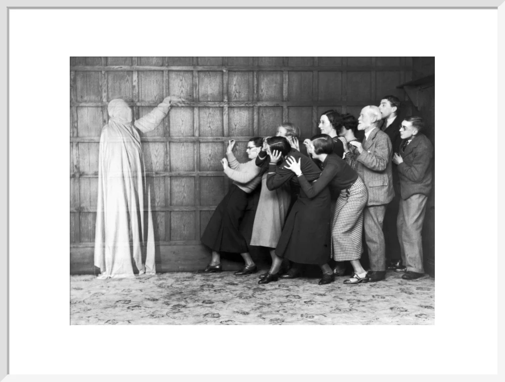 People 'cowering in fear' at the sight of a ghost, c 1920s. - Image 57