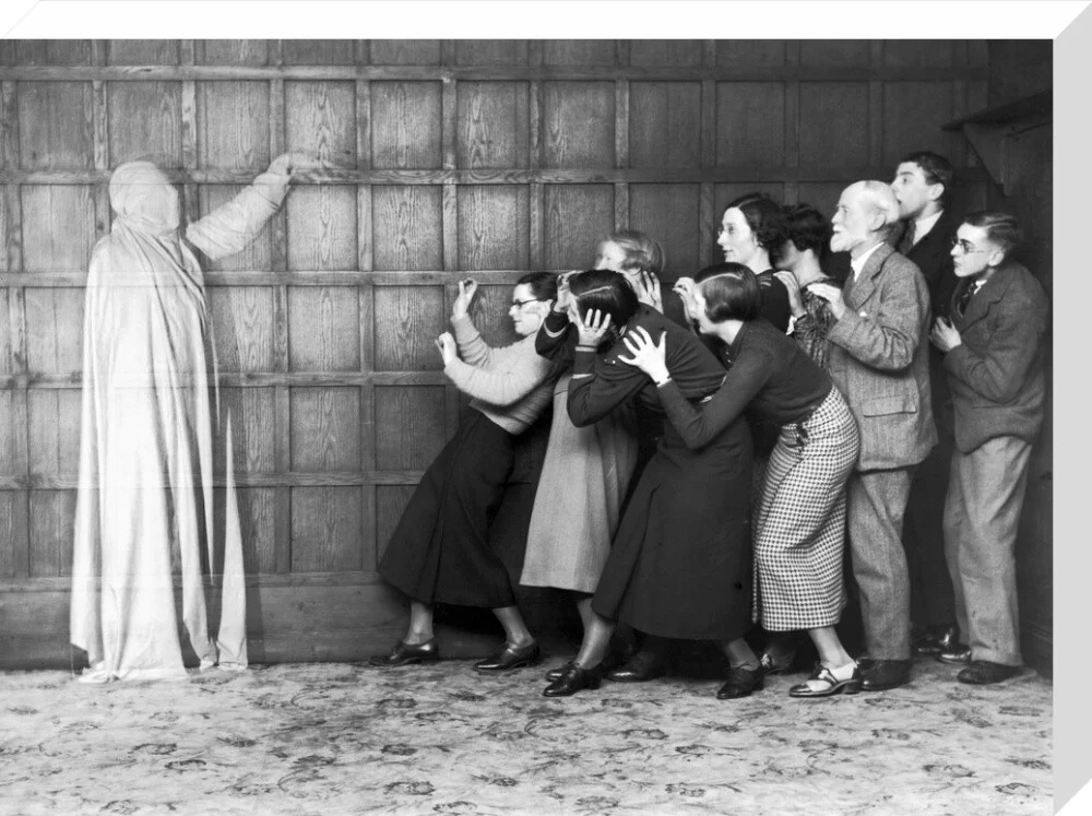 People 'cowering in fear' at the sight of a ghost, c 1920s. - Image 66