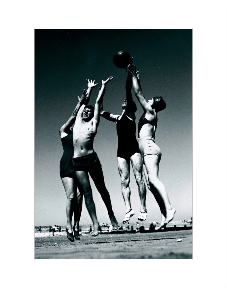 Men and women jumping for a basketball by the sea, 1930s. - Image 2