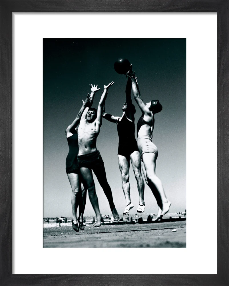 Men and women jumping for a basketball by the sea, 1930s. - Image 36