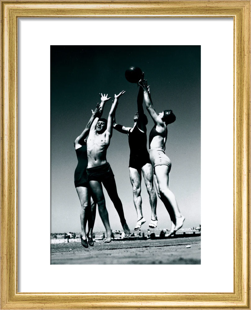 Men and women jumping for a basketball by the sea, 1930s. - Image 38