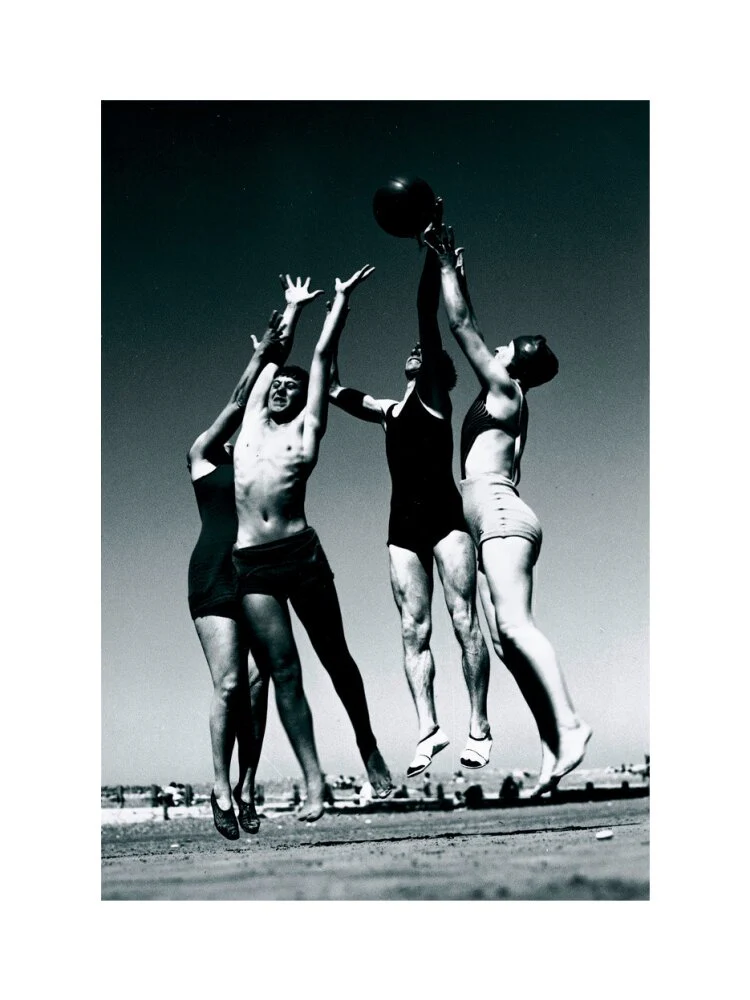 Men and women jumping for a basketball by the sea, 1930s. - Image 40