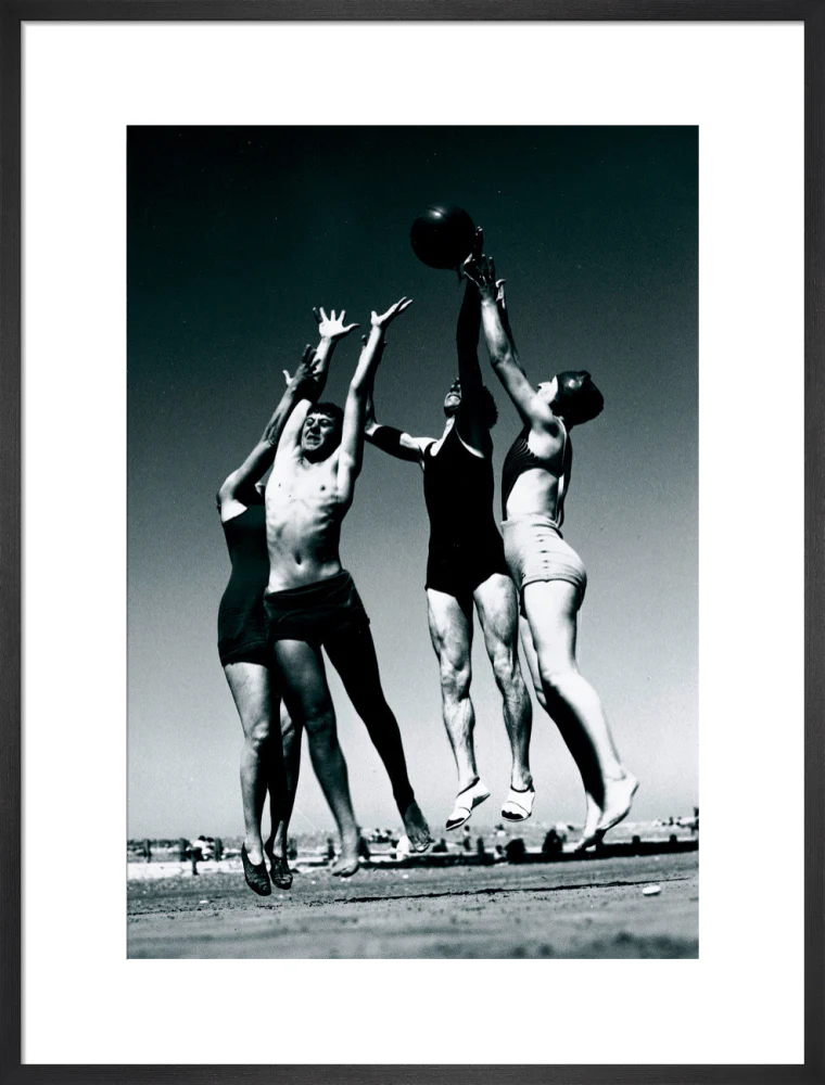 Men and women jumping for a basketball by the sea, 1930s. - Image 51