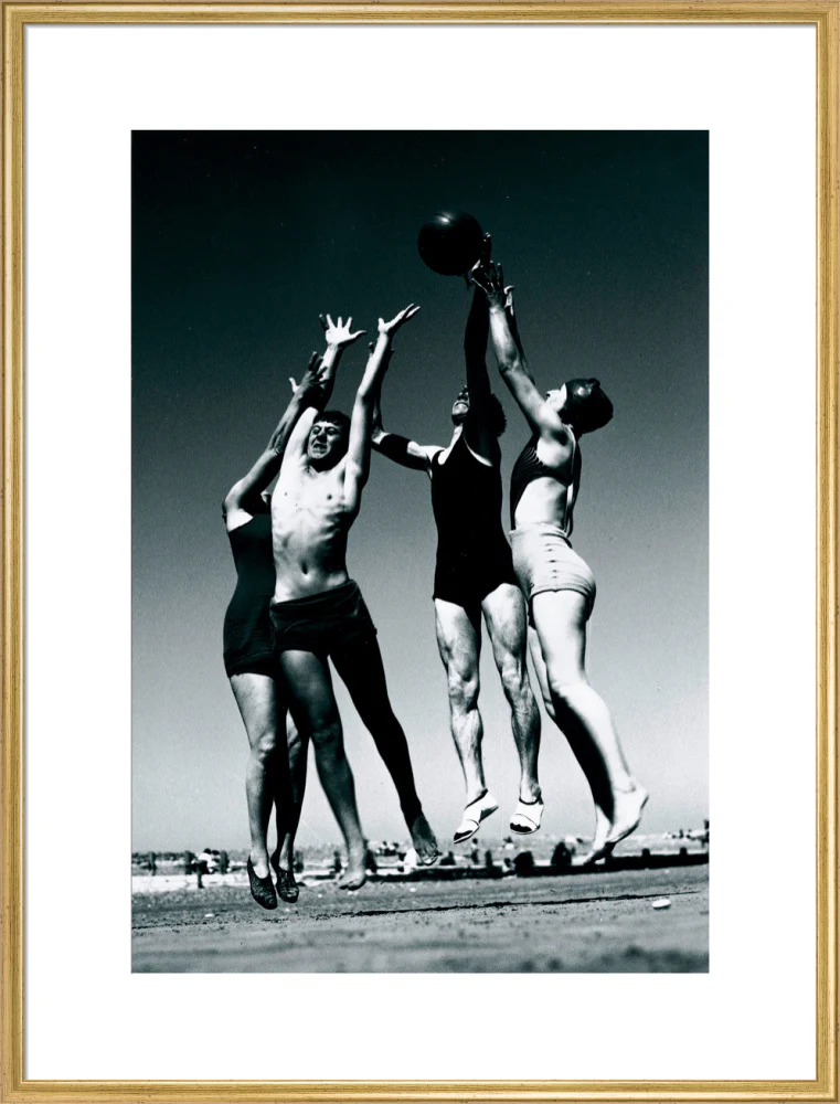 Men and women jumping for a basketball by the sea, 1930s. - Image 58