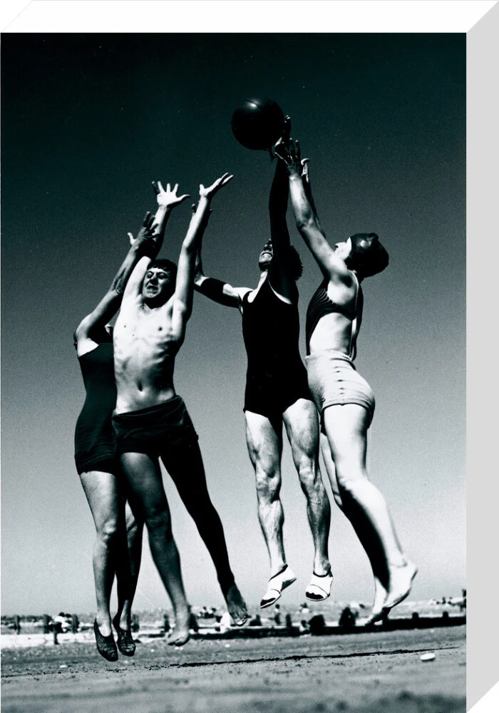 Men and women jumping for a basketball by the sea, 1930s. - Image 65