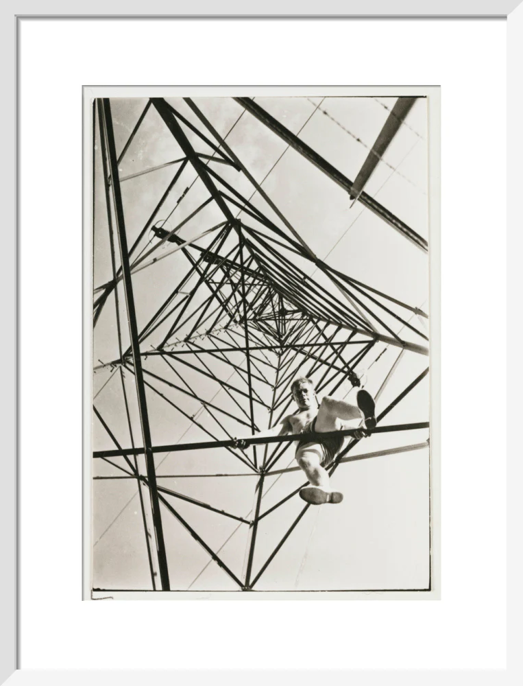 Man climbing a pylon, c 1930. - Image 14