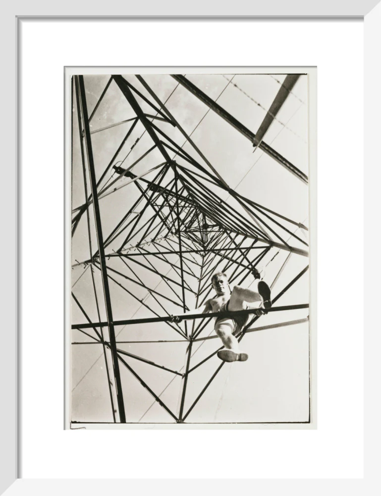 Man climbing a pylon, c 1930. - Image 42