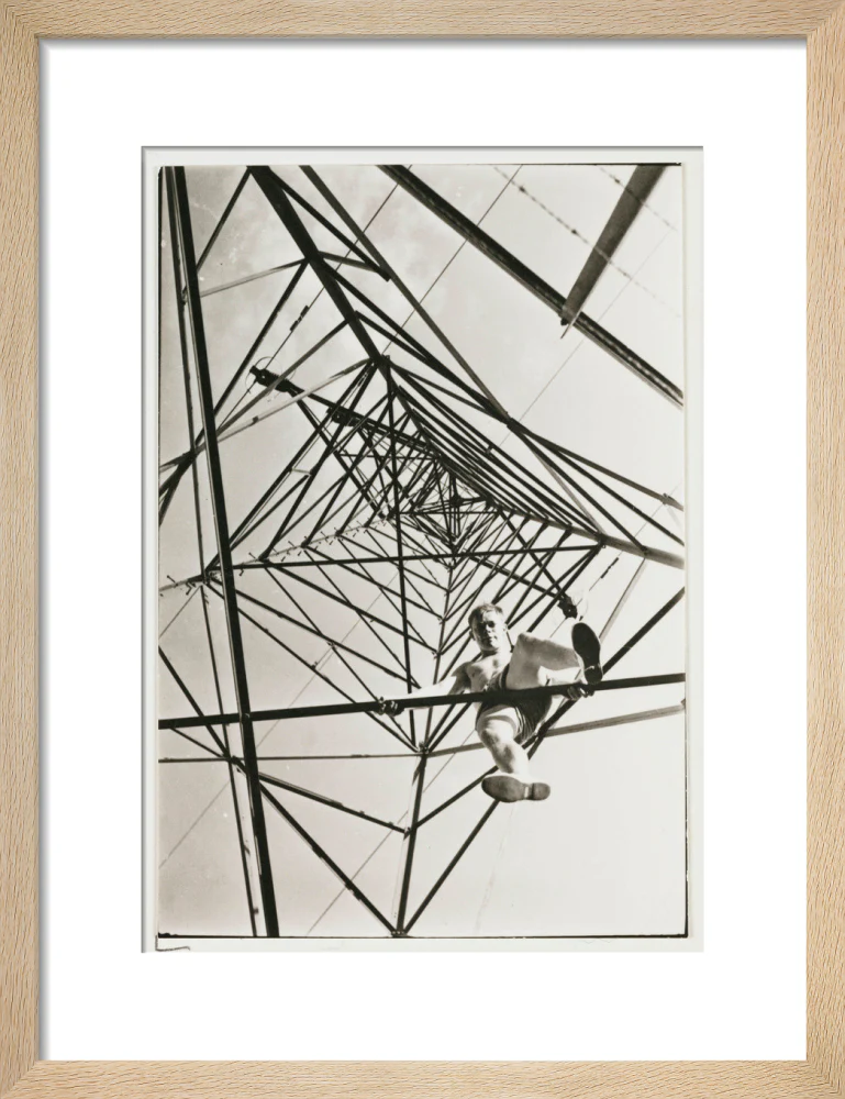 Man climbing a pylon, c 1930. - Image 44