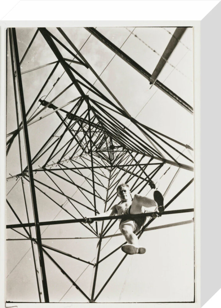 Man climbing a pylon, c 1930. - Image 64