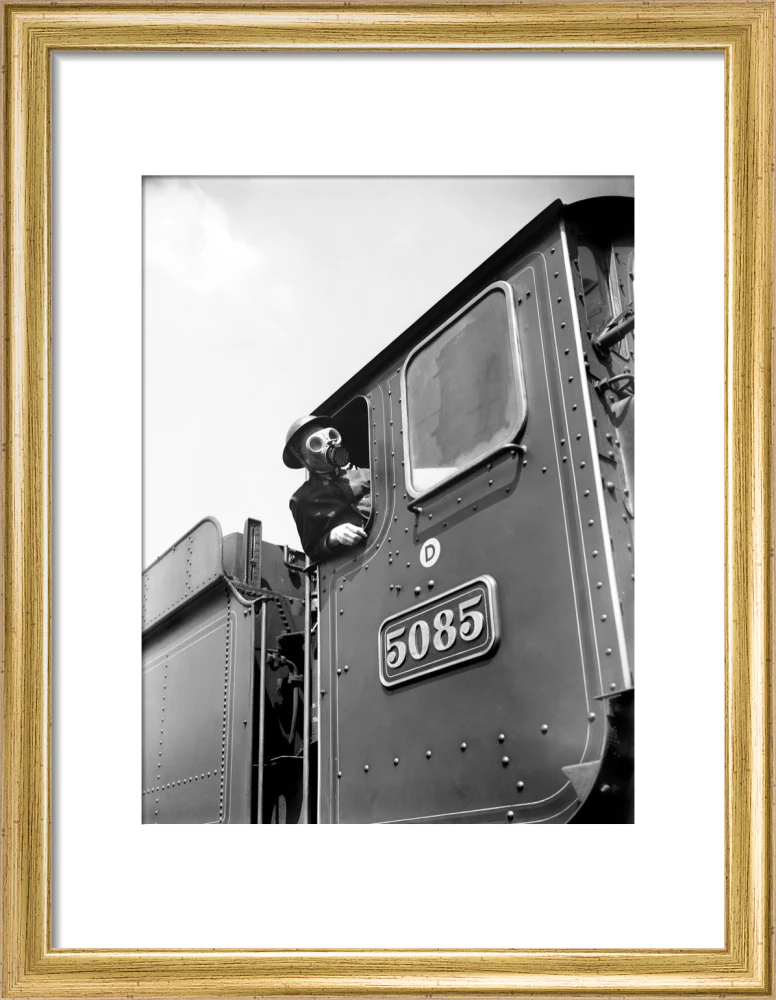 Train driver with a gas mask, World War Two, 21 August 1940. - Image 10