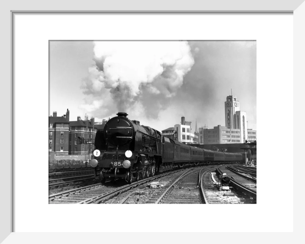 'Howard of Effingham' leaving London Victoria station, c 1939. - Image 4