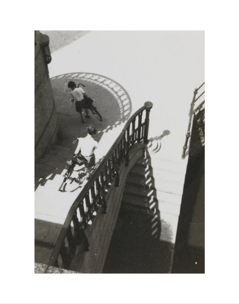 Carrying bicycles down steps - Image 2