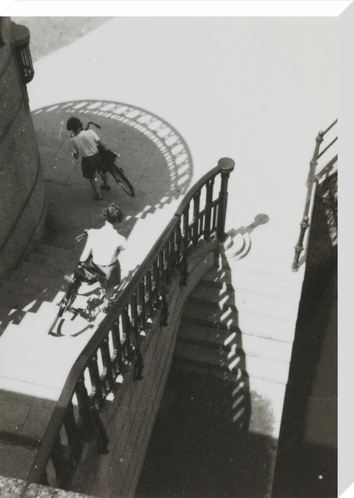 Carrying bicycles down steps - Image 33