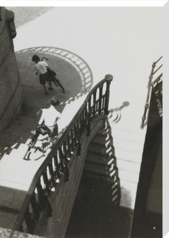 Carrying bicycles down steps - Image 67