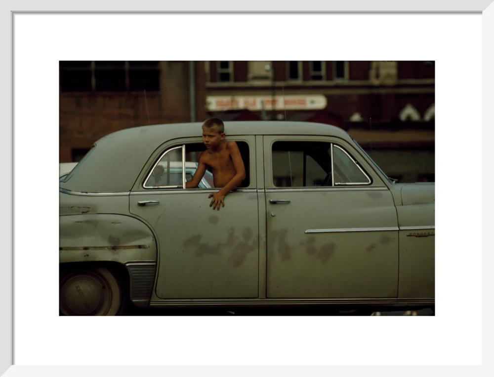 Boy in car, USA. 1965 - Image 14