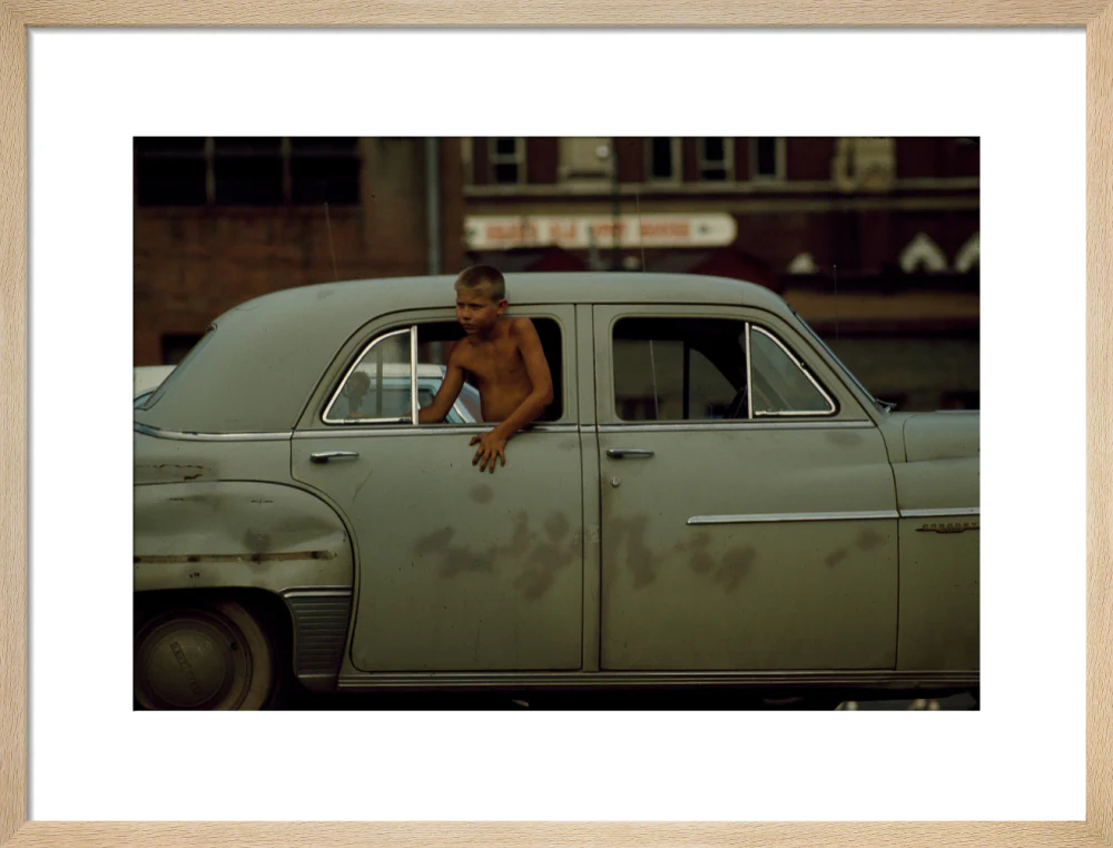 Boy in car, USA. 1965 - Image 49
