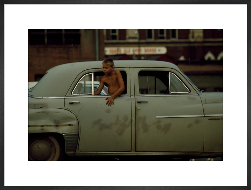 Boy in car, USA. 1965 - Image 56