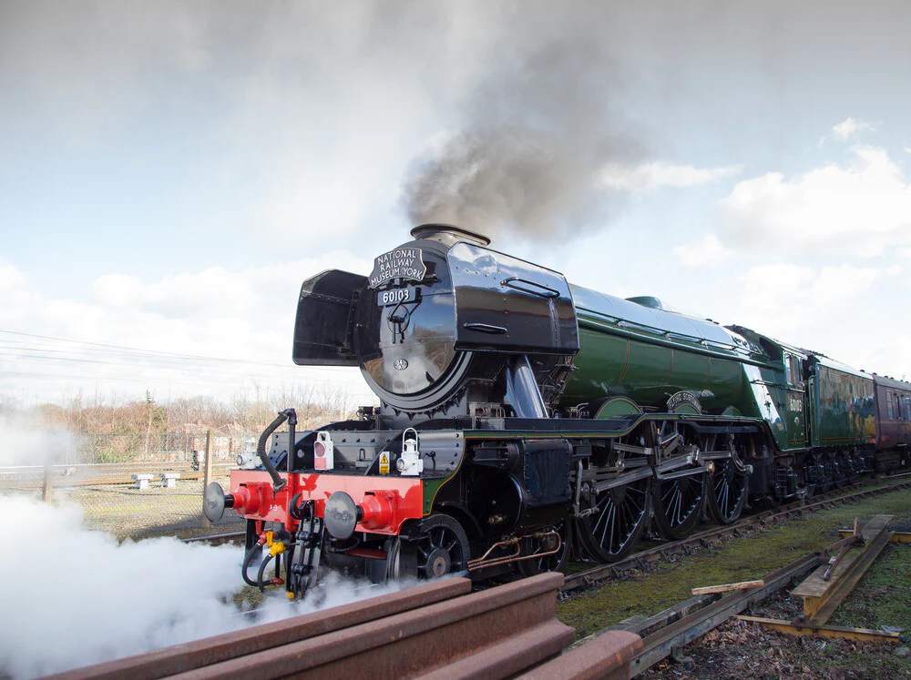 Flying Scotsman locomotive leaving the National Railway Museum, 2016.