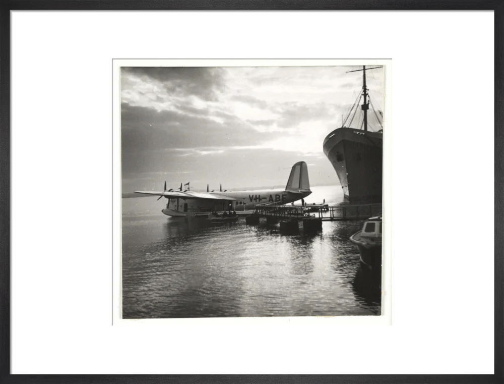 Flying boat moored at a jetty, c 1935. - Image 18