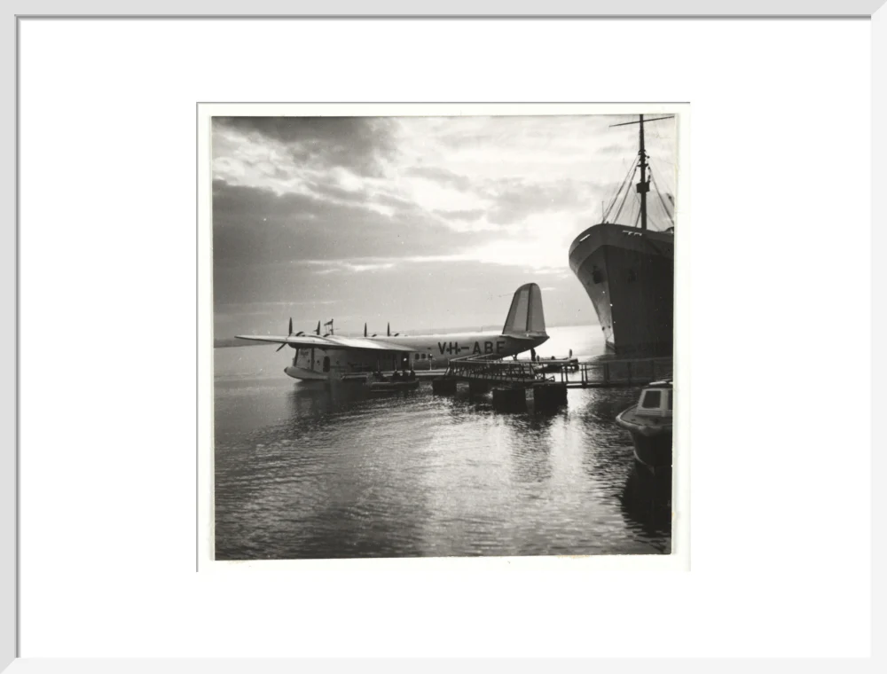 Flying boat moored at a jetty, c 1935. - Image 19