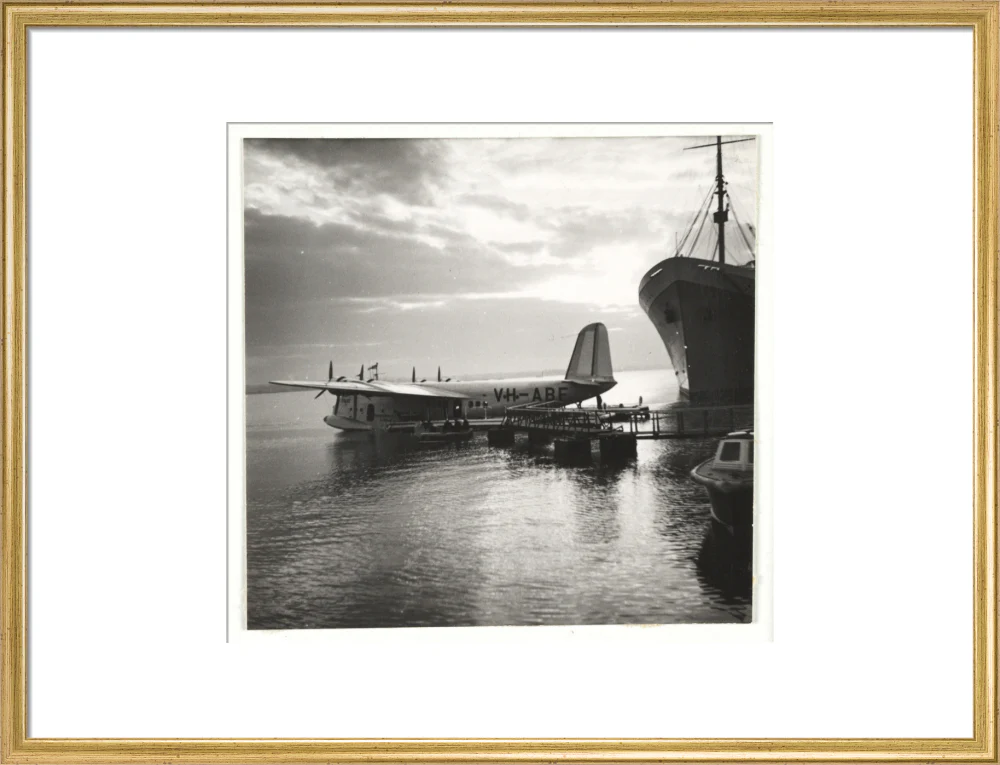 Flying boat moored at a jetty, c 1935. - Image 20