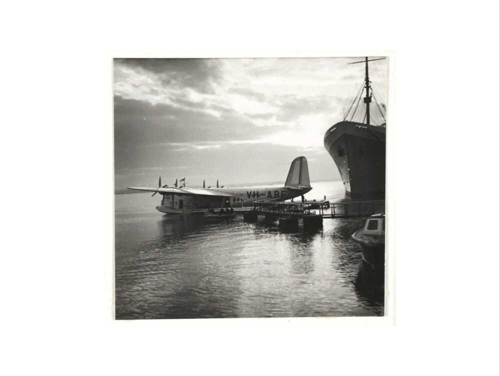 Flying boat moored at a jetty, c 1935. - Image 22