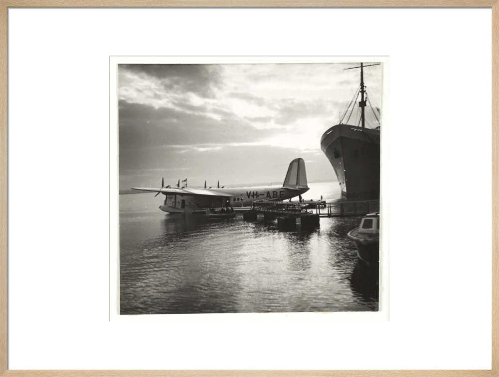 Flying boat moored at a jetty, c 1935. - Image 26