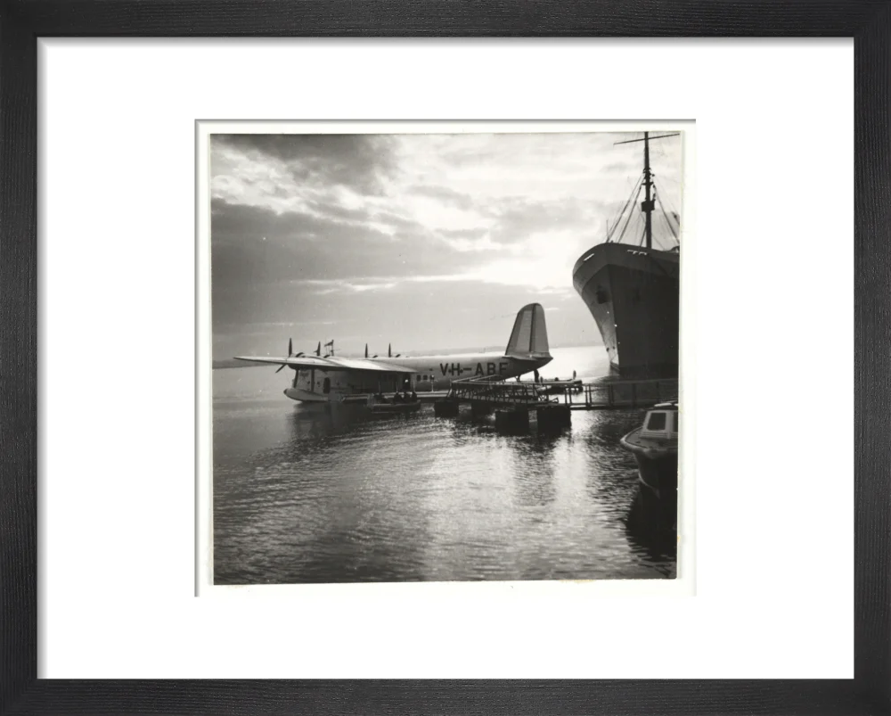 Flying boat moored at a jetty, c 1935. - Image 3