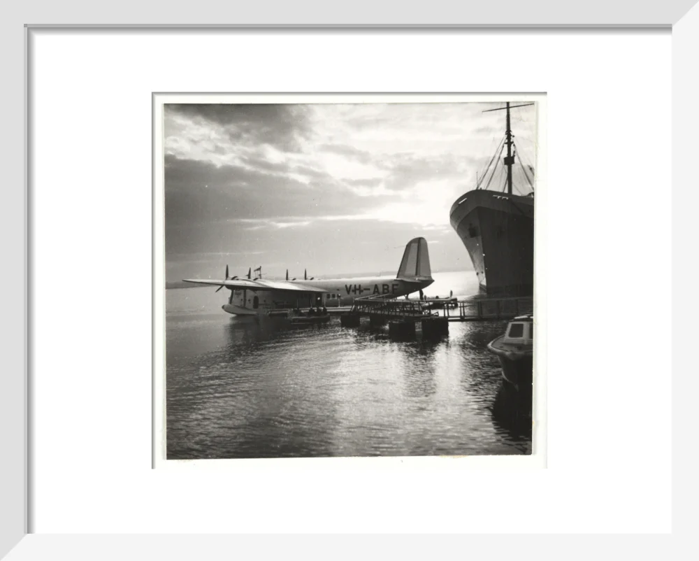 Flying boat moored at a jetty, c 1935. - Image 4