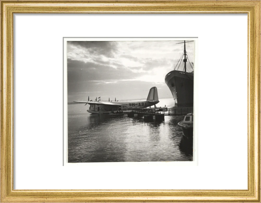 Flying boat moored at a jetty, c 1935. - Image 43