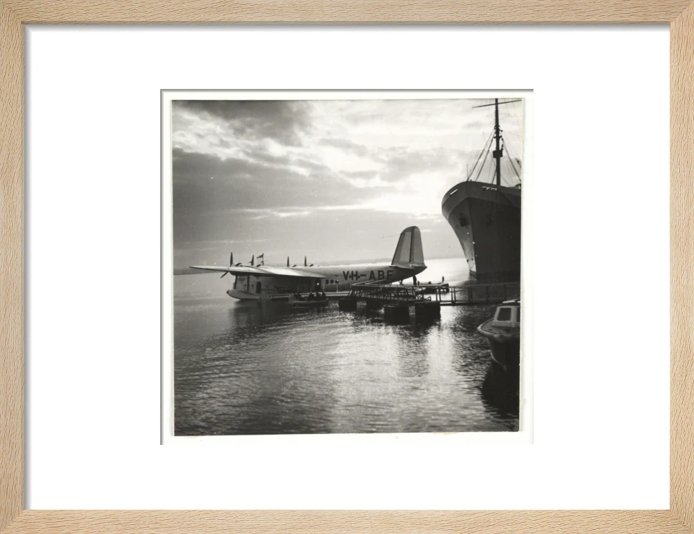 Flying boat moored at a jetty, c 1935. - Image 44