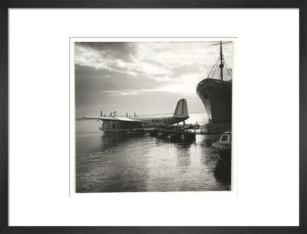 Flying boat moored at a jetty, c 1935. - Image 46