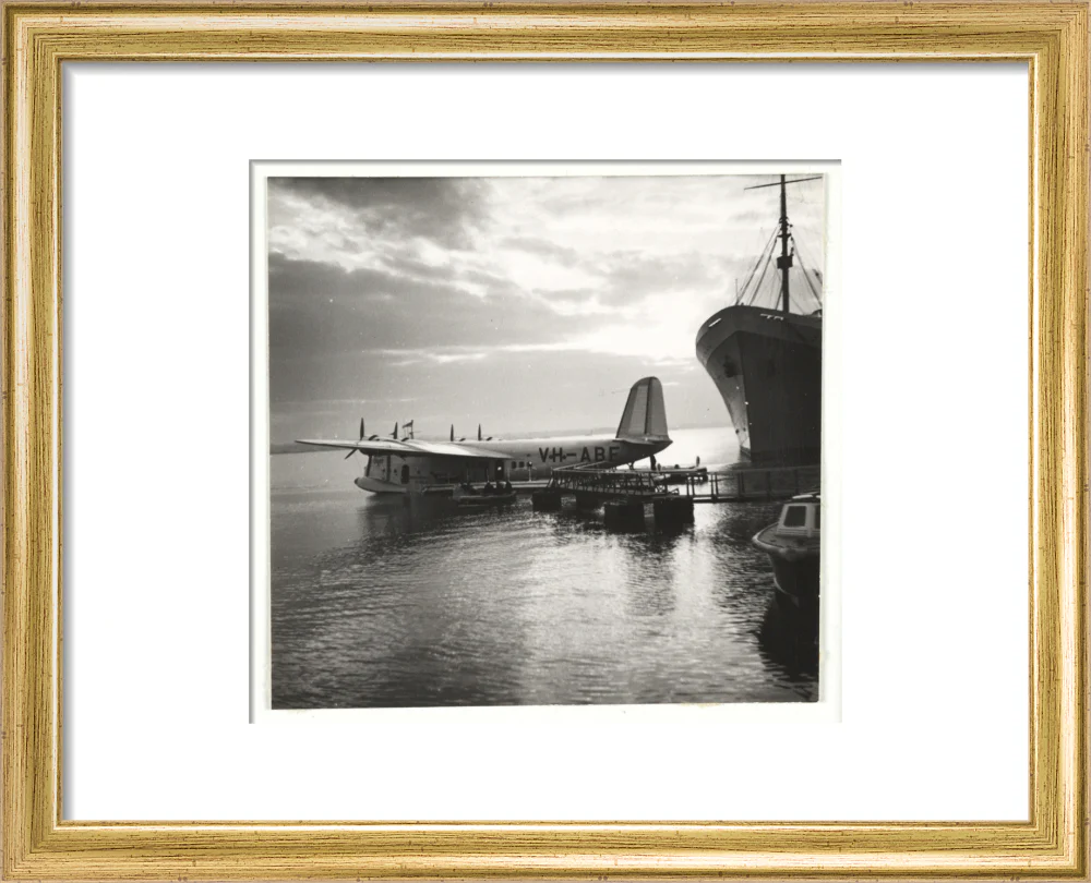 Flying boat moored at a jetty, c 1935. - Image 5