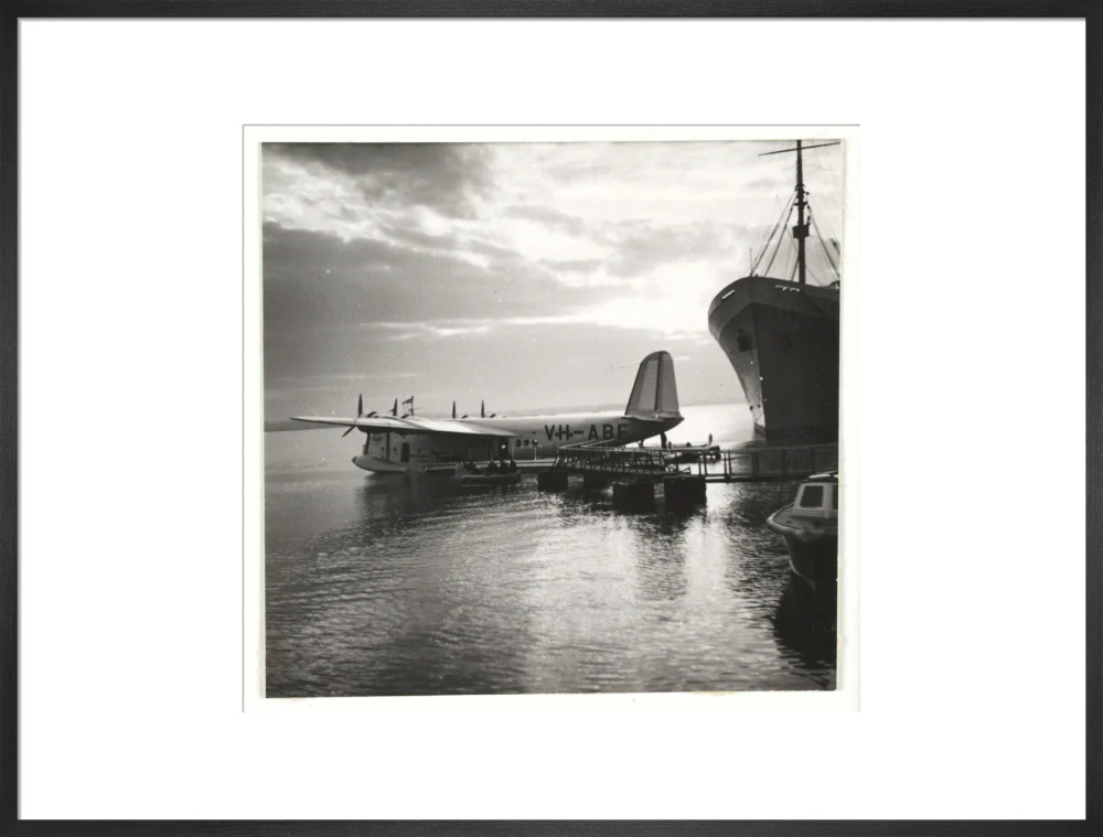 Flying boat moored at a jetty, c 1935. - Image 56