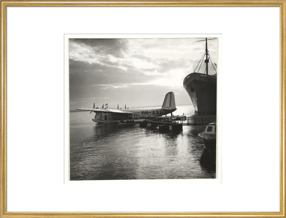 Flying boat moored at a jetty, c 1935. - Image 58